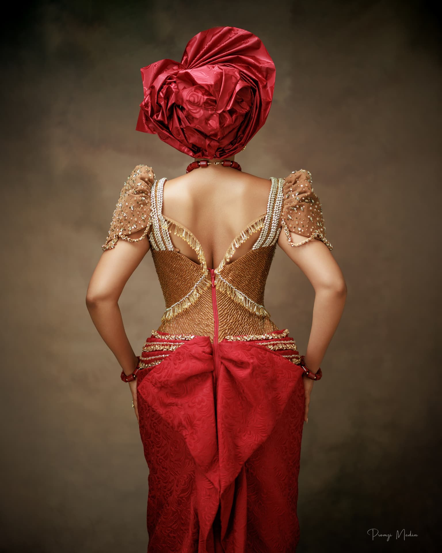 Beaded back with gold fringe