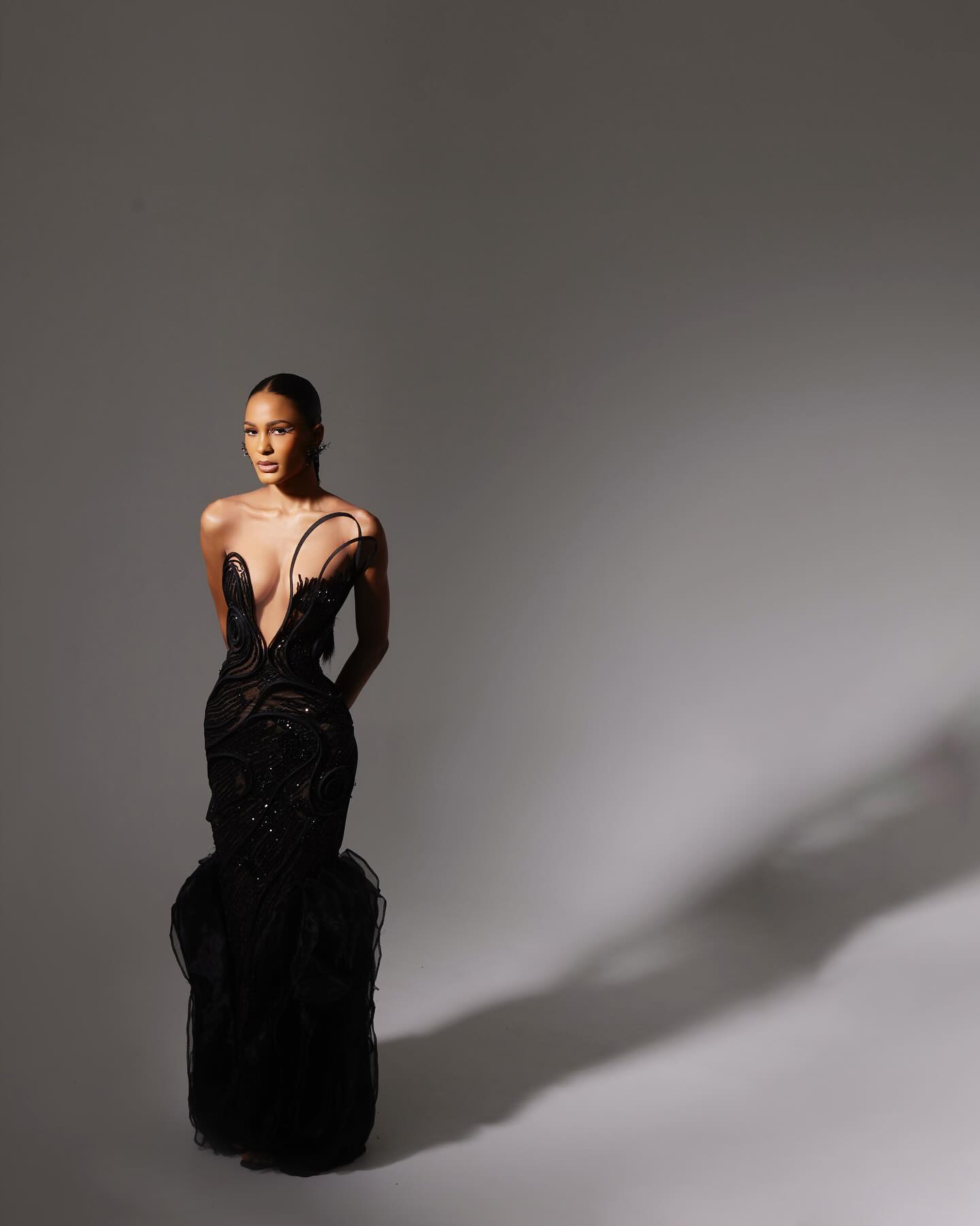 Beaded black column with organza hem